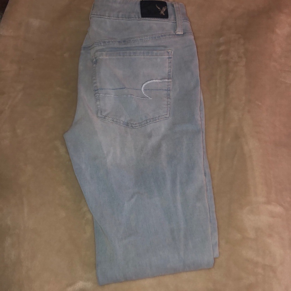 American Eagle Light Blue Ripped Jeggings